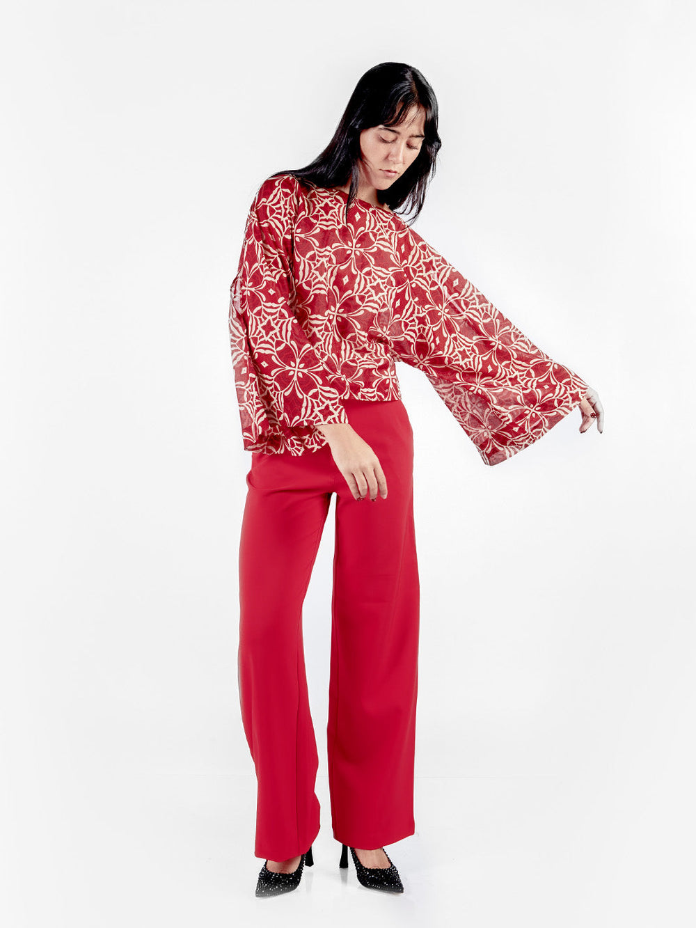 Blusa manga rangla con aberturas estampada