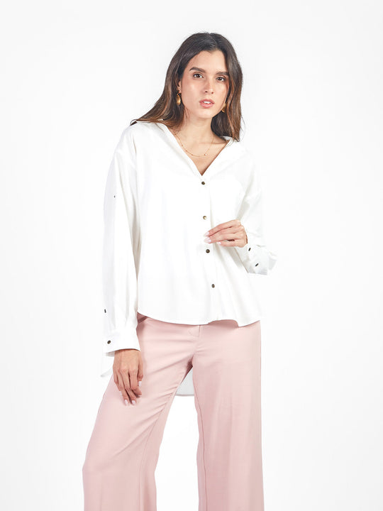 Blusa oversized con broches
