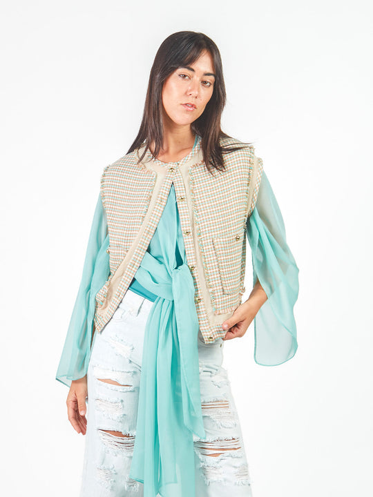 Chaleco tweed con transparencias