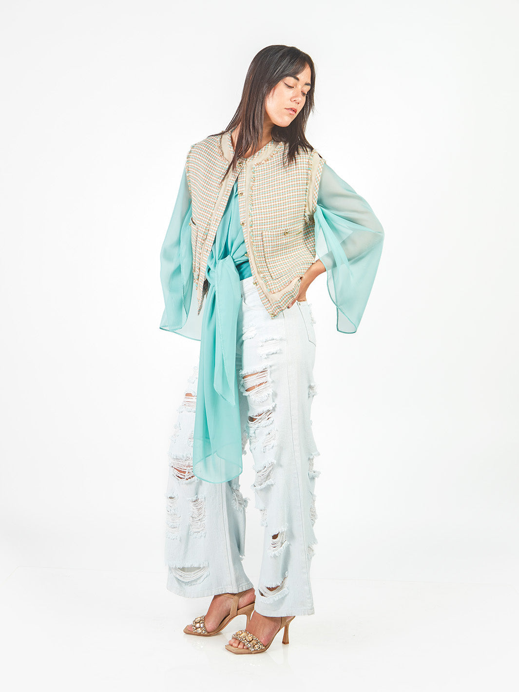 Chaleco tweed con transparencias