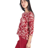 Polo con abertura en espalda estampado floral Magenta
