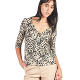Polo manga 3/4 con escote V nudo Beige
