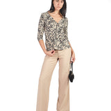 Polo manga 3/4 con escote V nudo Beige