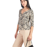 Polo manga 3/4 con escote V nudo Beige