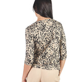 Polo manga 3/4 con escote V nudo Beige