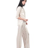 Pantalón recto de franjas doradas CREMA